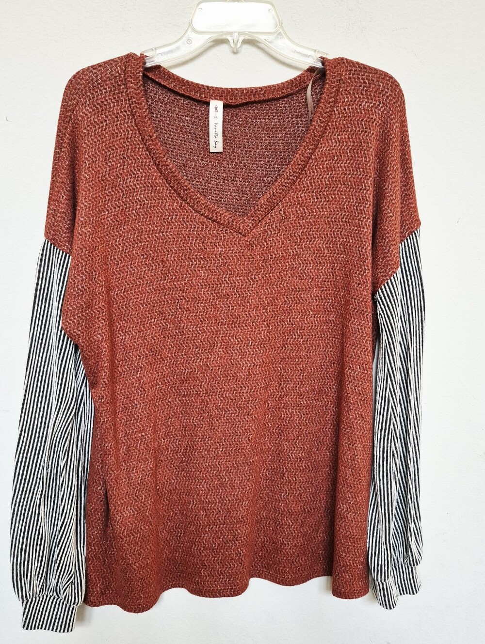 Vanilla Bay Rust V-Neck Sweater with Black & White Striped Sleeves